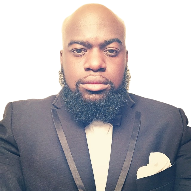 A photo of author Peg Gui in a black suit and bow tie, standing in front of a plain white background.